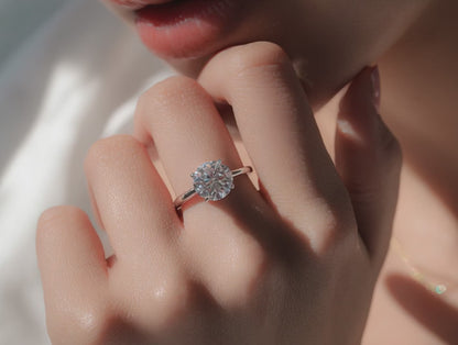 14K white gold engagement ring with a "Sparkle" diamond