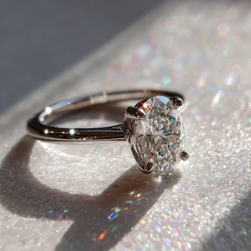 Златен пръстен „Кристалия“ с овален диамант